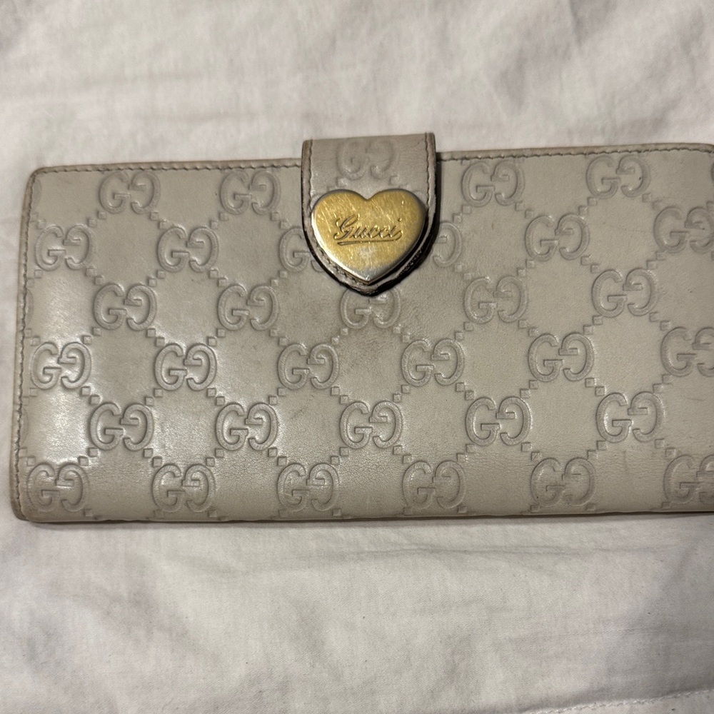 Gucci Embossed Leather Wallet with Gold Accent